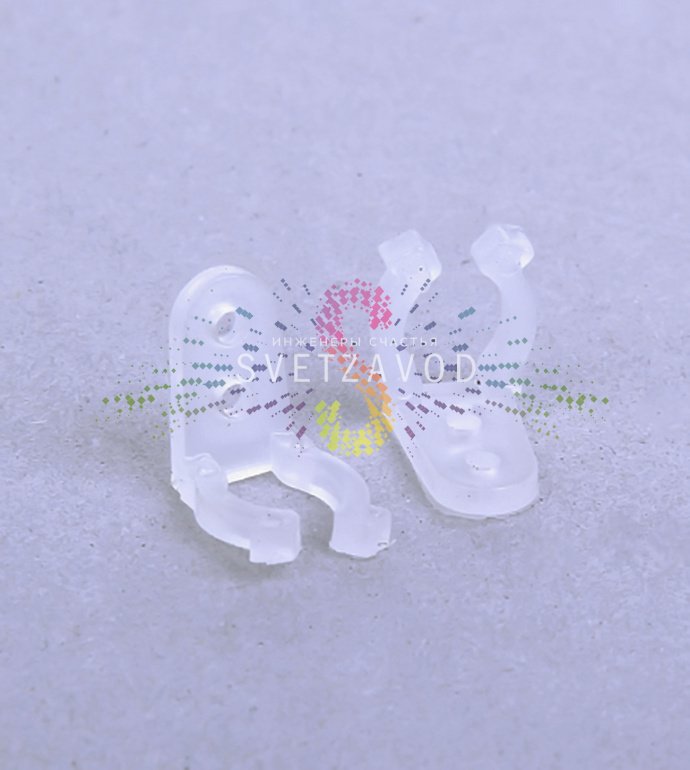 Крупный план монтажной клипсы Rich Led для светодиодного дюралайта диаметром 13 мм, демонстрирующий конструкцию защелки и отверстие для крепления.