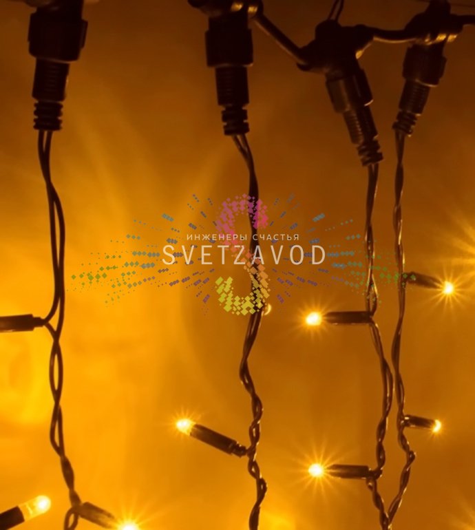 Детальное фото светодиодного дождя 2х6м с желтыми мерцающими диодами на черных ПВХ нитях, видна упаковка и комплектация.