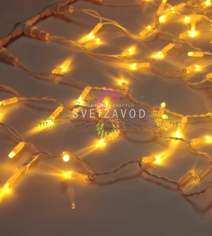 Детальное фото светодиодного дождя 2х3м: желтые мерцающие нити, коннекторы, блок питания в комплекте, степень защиты IP65.