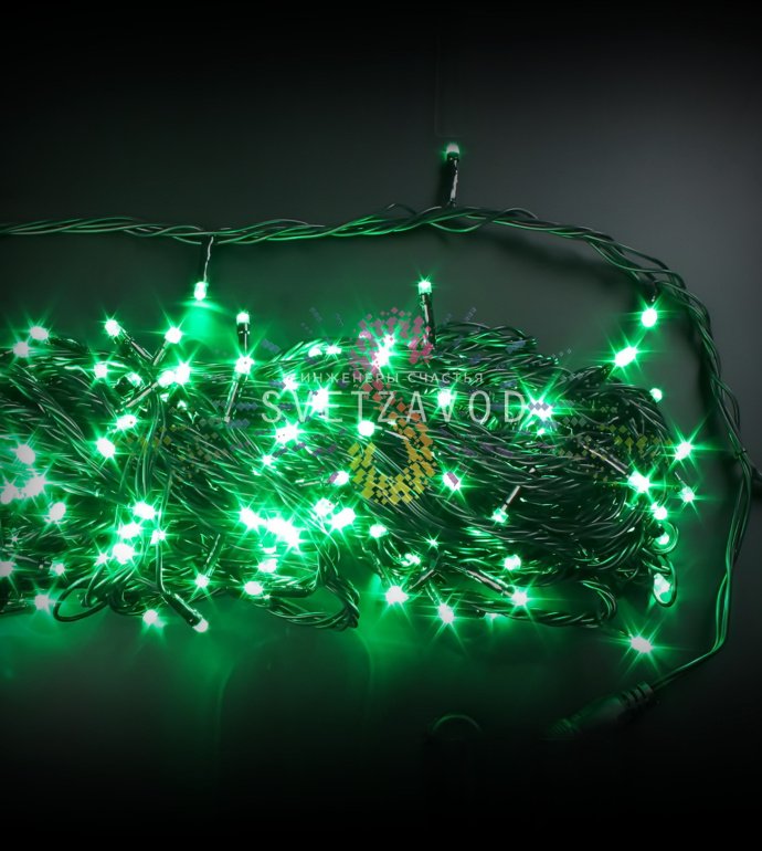 Детальное фото гирлянды-нити Твинкл Лайт: зеленые светодиоды DIP на черном ПВХ-проводе, расстояние 10 см, видна маркировка. Детальное фото гирлянды-нити Твинкл Лайт: зеленые светодиоды DIP на черном ПВХ-проводе, расстояние 10 см, видна маркировка.