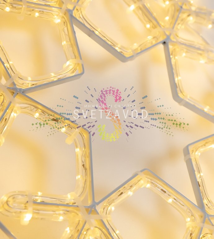 Детальное фото светодиодной снежинки Neon-Night на металлическом каркасе. Видны светодиодный дюралайт, ушко для монтажа и шнур питания.