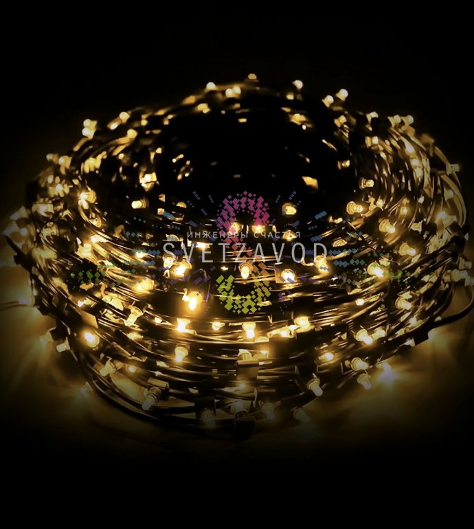 Детальное фото гирлянды Клип Лайт 12В: темно-зеленый ПВХ провод, светодиоды с защитными колпачками, влагозащищенные разъемы, понижающий трансформатор 220/12В.