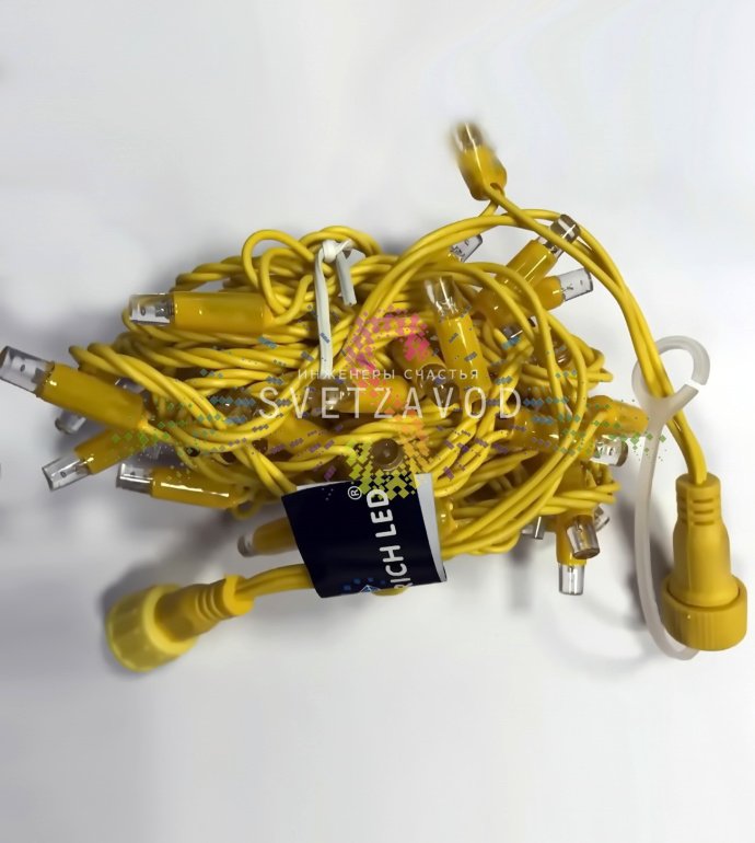 Детальное фото гирлянды-нити Стринг Лайт Rich Led: желтые светодиоды DIP на желтом ПВХ проводе, защитные колпачки, степень защиты IP65.