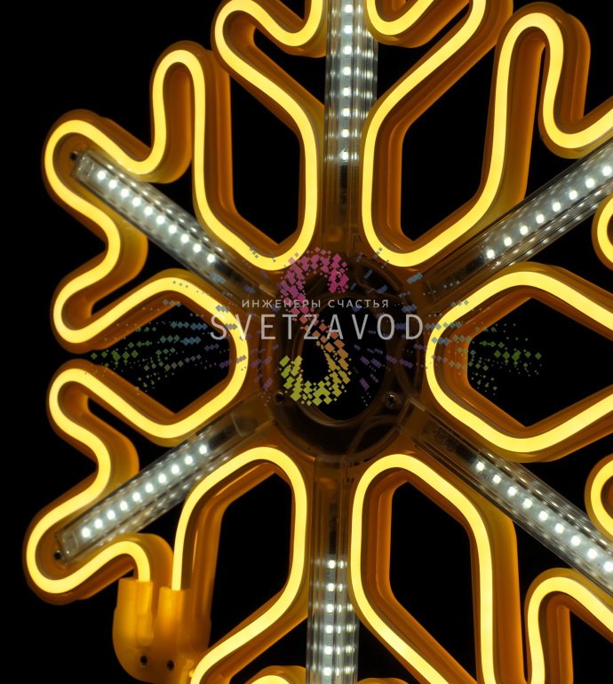 Крупный план светодиодной снежинки из гибкого неона с эффектом динамичной подсветки 'тающие сосульки', предназначенной для уличного и интерьерного использования.