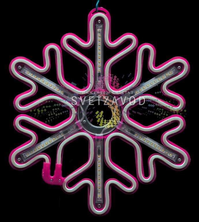 Крупный план розовой светодиодной снежинки из гибкого неона на пластиковом каркасе, демонстрирующий эффект плавно стекающих сосулек. Видно крепежное ушко и кабель питания.