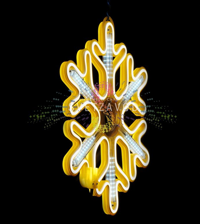 Крупный план светодиодной снежинки из гибкого неона с эффектом динамичной подсветки 'тающие сосульки', предназначенной для уличного и интерьерного использования.