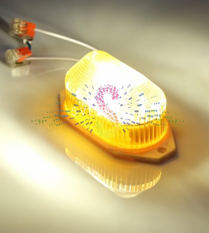 Детальное изображение желтой ксеноновой строб-лампы SST-101 с накладным креплением, корпусом IP65 и размерами 11,6х6х5,6 см.