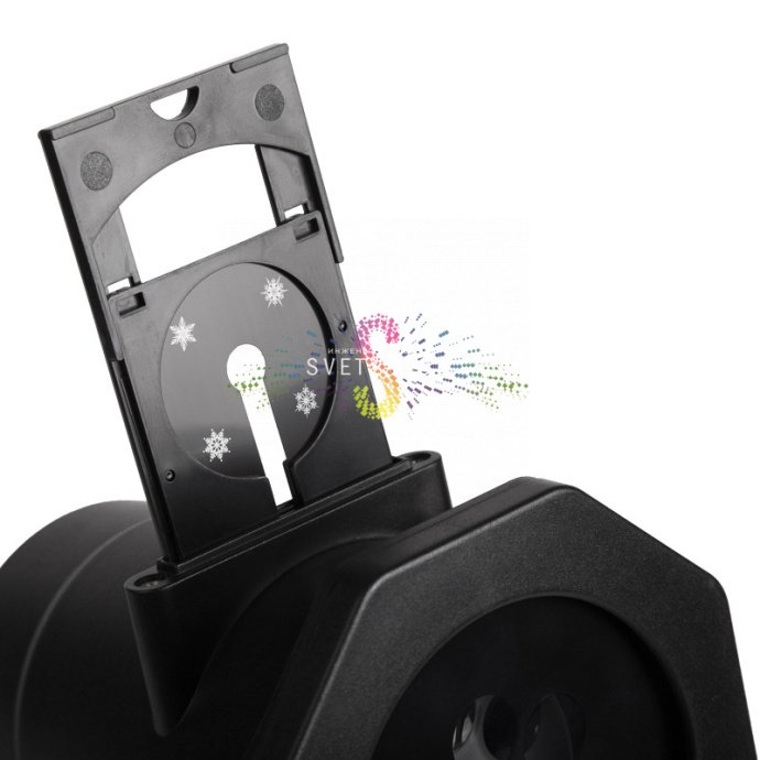 Детальное фото светодиодного проектора Neon-Night: черный корпус из АБС-пластика, разъемы, блок питания и набор из 12 слайдов с различными тематическими проекциями.