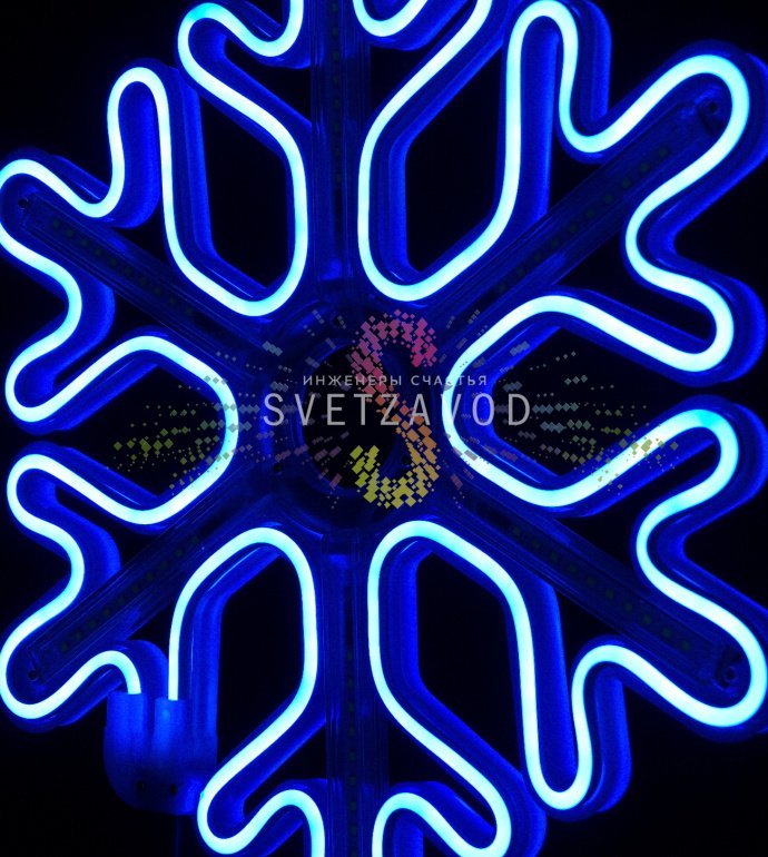 Крупный план синей светодиодной неоновой снежинки размером 40 см с эффектом плавного перелива света, имитирующего тающие сосульки, на упаковке с маркировкой IP65