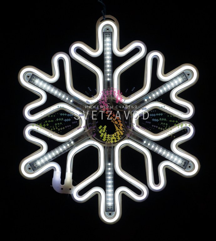 Крупный план светодиодной снежинки 40 см из белого неона с эффектом тающих сосулек, вилка питания и ушко для монтажа.