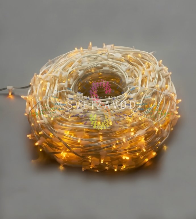 Детальное фото светодиодного Клип Лайта 12В: желтые мерцающие диоды на прозрачном ПВХ проводе, влагозащищенный разъем.