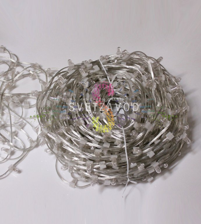 Детальное фото гирлянды Клип Лайт 12В: прозрачный ПВХ кабель, светодиоды в защитных колпачках через каждые 15 см, бухта 100 метров.