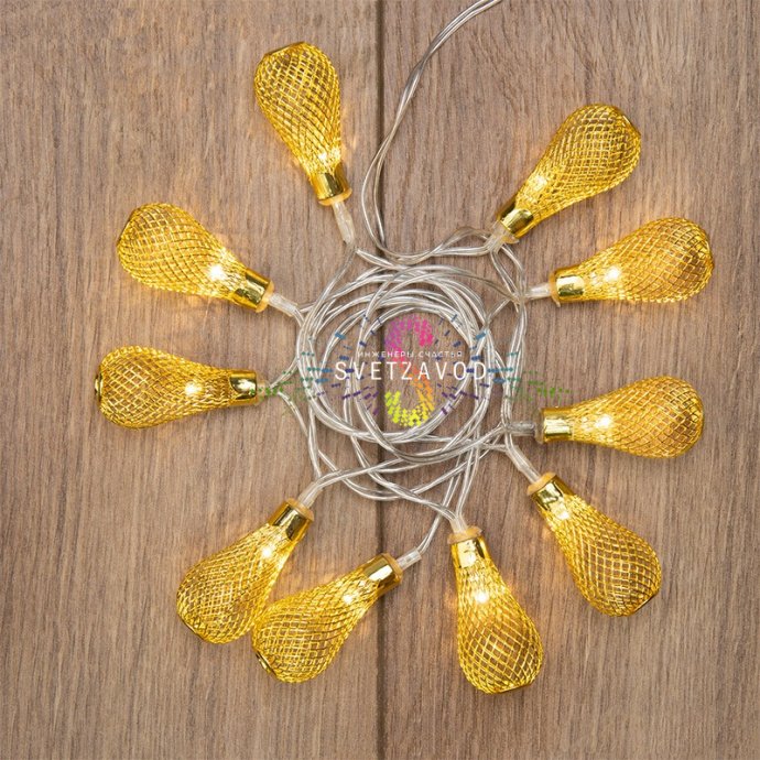 Детальное фото гирлянды Восточные фонарики Neon-Night: 10 ажурных золотистых фонариков на гибком прозрачном проводе длиной 1.5 метра с батарейным блоком.