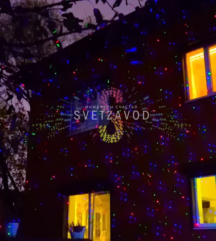 Профессиональный лазерный проектор Garden X-41P в работе, создающий объемные 3D-узоры на стене здания в темное время суток.