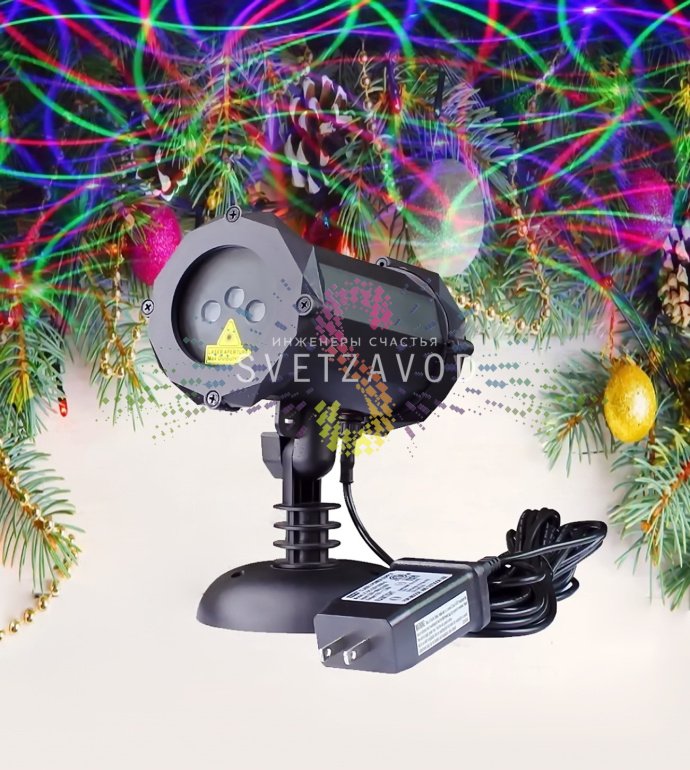 Профессиональный лазерный проектор Garden X-41P в работе, создающий объемные 3D-узоры на стене здания в темное время суток.