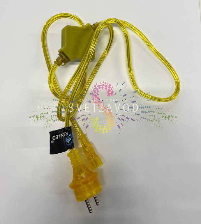 Детальное фото универсального блока питания Rich Led SGG-807 золотого цвета с проводами, разъемами и маркировкой 220В 2А.