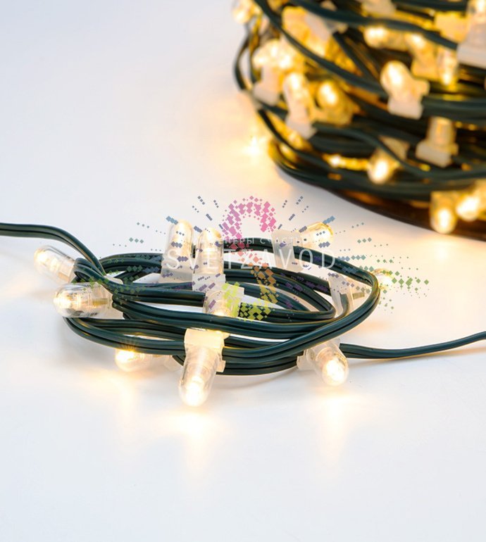 Крупный план светодиодного Клип Лайта 12В с защитными колпачками, демонстрирующий равномерное расположение диодов на зеленом ПВХ-кабеле.