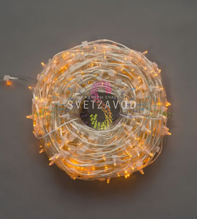 Крупный план светодиодного кабеля Клип Лайт 12В: желтые светодиоды в защитных колпачках на прозрачном ПВХ проводе, демонстрация степени защиты IP64.