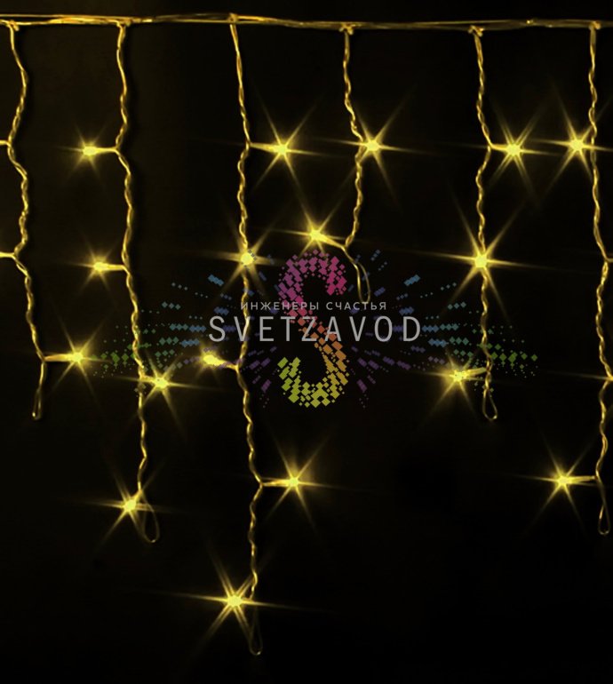 Крупный план светодиодной бахромы Айсикл Rich Led: мерцающие желтые светодиоды на прозрачных проводах разной длины, создающие эффект сосулек. Видны коннекторы для соединения.