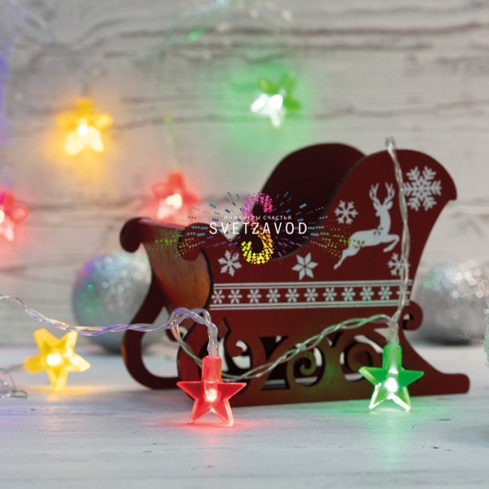 Детальное фото гирлянды Neon-Night Звездочки: матовые разноцветные звездочки, прозрачный ПВХ провод длиной 1,5 м, батарейный блок для 2х АА.