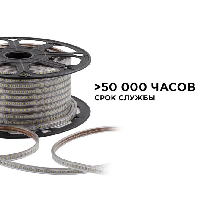 Макрофотография: гибкая светодиодная лента 220В 7Вт холодный белый свет 6500K в прозрачной силиконовой оболочке, видны smd2835 чипы, на катушке 50 метров