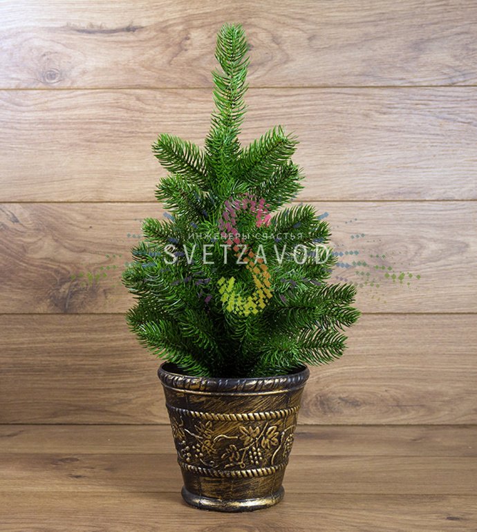 Детальное фото искусственной ели Neon-Night: литые ветки с тщательно проработанной хвоей, пластиковый бронзовый горшок, общий размер 45 см.