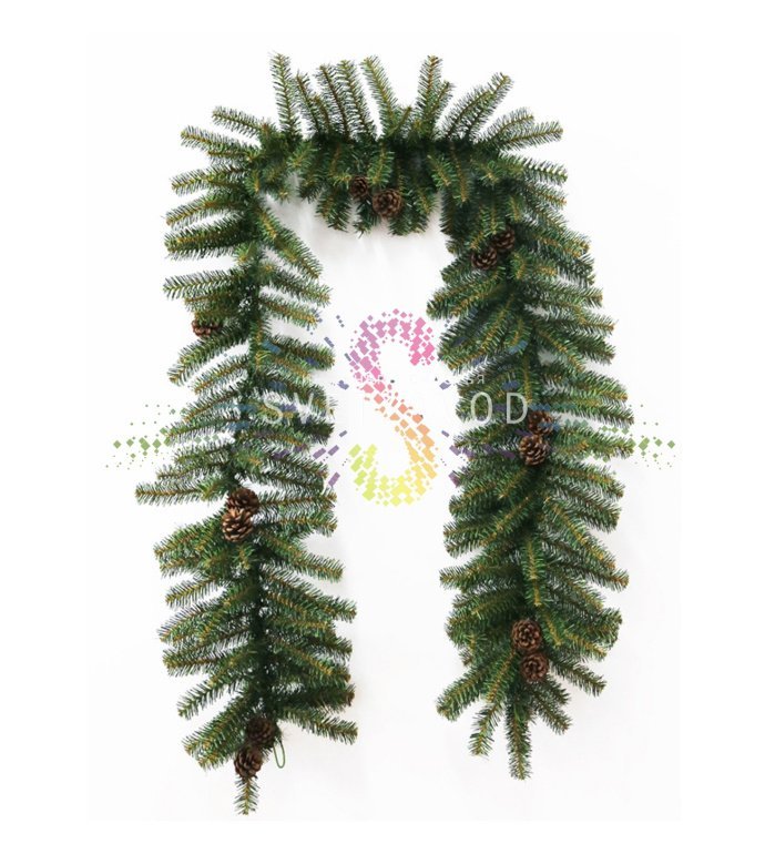 Детальное фото елового шлейфа Neon-Night: видна структура из 220 гибких веток ПВХ с иголками 0.07 мм и 14 декоративных шишек, демонстрируется длина 2,7 м и диаметр 36 см.