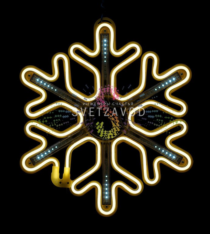 Крупный план светодиодной снежинки из гибкого неона с эффектом динамичной подсветки 'тающие сосульки', предназначенной для уличного и интерьерного использования.