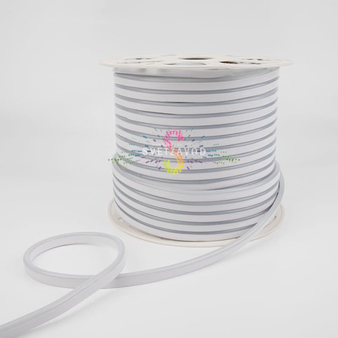 Крупный план светящегося гибкого неона Neon-Night прямоугольного сечения 8х16 мм в теплом белом свете, демонстрирующий равномерное свечение и гибкую структуру.