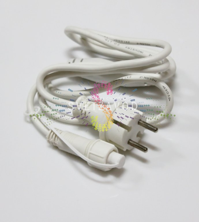 Детальное фото блока питания 220В, 3А (арт. 303-500-1) для подключения светодиодной бахромы длиной 5,6 метров. Видны разъемы, белый провод и маркировка.